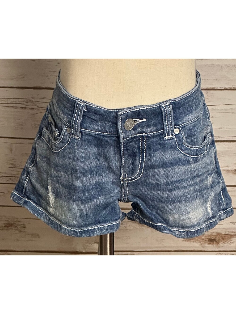 BKE Sabrina medium wash low-rise distressed stretch denim shorts Size 26 Y2K